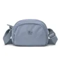 Casual nylon crossbody shoulder bag with multiple compartments and adjustable strap for travel. - Blue