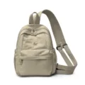 Casual nylon convertible backpack in beige with front zipper pocket and multiple compartments. - Khaki