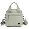 Lightweight casual canvas crossbody bag for women, portable shoulder bag for daily commute. - Milky Apricot