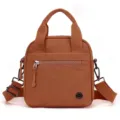 Brown canvas casual crossbody bag with top handles, lightweight daily shoulder handbag. - Caramel color