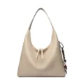 Beige leather hobo shoulder bag, casual everyday purse variant with chic side charm. - Apricot