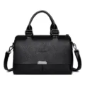 Fashionable black leather handbag with top handles and shoulder strap, large capacity for daily commuting. - Black