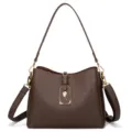 Classic brown leather shoulder bag, chic crossbody tote with gold hardware and rose detail. - Coffee