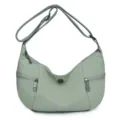 Casual green nylon crossbody bag with multi pockets and adjustable strap for daily commute. - Lake Green