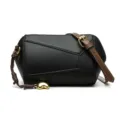 Sac à bandoulière cylindrique noir en cuir pour femme, sac élégant pour le travail quotidien. - Noir