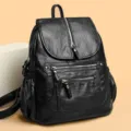 Sac à dos en cuir noir classique pour femmes, grand sac de voyage élégant et pratique. - Noir