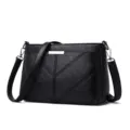 Sac à bandoulière en cuir souple noir pour femme, sac élégant avec décor en métal. - Noir