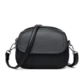 Petit sac bandoulière noir pour femme, sac rond souple en cuir synthétique pour usage quotidien. - Noir