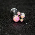Detailed close-up of a stainless steel cat claw labret stud with pink opal body piercing jewelry. - 1.2*6mm / Pink (OP42)