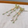 Elegant long drop earrings featuring green crystal butterflies and pearls for women. - 04# Gradient Green Crystal Butterfly Gold Fringe