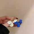 Stunning blue and white flower drop earrings with gold tone metal hoop for women fashion style. - Blue Flower Silver Post Earrings