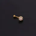 Goldfarbenes Piercing aus Edelstahl mit funkelnden Zirkonia Steinen in Blumenform gestaltet. - Stil 3 Gold