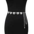 Close-up of silver metal heart waist chain, vintage carved link body chain detail for women. - Heart / Silver