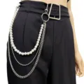 Close-up of multi-layer waist chain featuring faux pearls, delicate beads, and metal links. - Style 1 / Silver