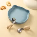 Cute silicone baby feeding plate with stainless steel fork and spoon set in blue and beige. - Plate With Fork And Spoon / Haze Blue