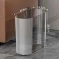 Clear plastic slim trash can narrow waste basket with vertical fluted design for bathroom. - Clear