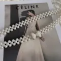 Close-up detail of elegant double-strand pearl waist chain with sparkling rhinestone bow. - Style 201 / Silver