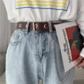 Women fashion punk style brown leather belt with metal grommets and chain decoration. - Coffee