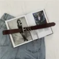 Punk style brown leather belt with metal rings and chain, perfect for casual jeans outfits. - Coffee