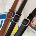 Detailed view of slim leather belts in brown, dark brown, and black with silver square buckles. - 105cm / Coffee