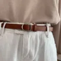 Brown leather belt detail, metal D-ring buckle close-up, stylish accessory for casual jeans. - 105cm / Camel