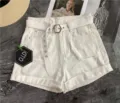 White denim shorts for women featuring stylish canvas belt and unique metal hexagonal buckle. - 105cm / White
