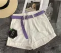 White denim shorts for women with purple canvas belt and hexagonal buckle, chic summer apparel. - 105cm / Purple
