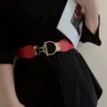 Red elastic wide waist belt for women, stylish metal interlocking buckle dress accessory. - Red