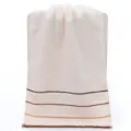 Soft absorbent cotton face towel featuring elegant brown horizontal stripes for daily use. - Beige Stripe