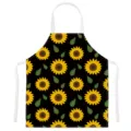 Schwarze Küchenschürze mit Sonnenblumen Muster, niedlicher Pflanzenprint zum Backen Kochen. - Einheitsgröße / Buchstabe C