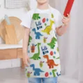 Kids dinosaur print cooking apron, cute cartoon bib for kitchen baking and household tasks. - Kids One Size / Letter E