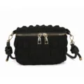 Black crinkled bubble crossbody bag with gold zippers and stylish knotted shoulder strap. - Black