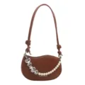 Brown shoulder bag with pearl strap and heart charms, stylish curved design for women daily wear. - Brown