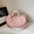 Grote reistas voor dames, lichte sport- en woon-werkhandtas, stijlvolle roze fitness tas voor onderweg. - Roze