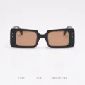 Square sunglasses frame detail view, stylish black TR material with brown polarized lenses. - Bright Black Tea Lens