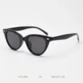 Detail view of black cat-eye polarized sunglasses, TR90 frame, retro street style eyewear. - Shiny Black Solid Grey C9