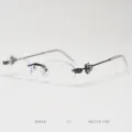 Fashionable rimless oval eyeglasses frame for women with rhinestone crystal temple decoration. - Black C1