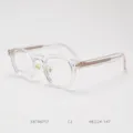 Detailed close-up of vintage clear optical glasses frame, featuring transparent acetate. - Transparent White C2