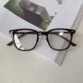 Detail view of stylish brown TR90 optical glasses frame for daily wear and prescription lenses. - Jelly Grey and Silver C4