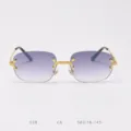 Detailed view of vintage rimless sunglasses with purple gradient lenses and gold metal details. - 18K Gold Gradient Grey C8