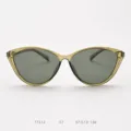 Close-up detail of vintage cat-eye sunglasses frame, elegant curved lines and dark polarized lenses. - Olive Green with G15 Lenses C7