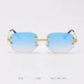 Vintage rimless sunglasses featuring blue gradient lenses and gold textured metal frame. - 18K Gold Blue Coating C58