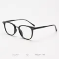 Detailed view of vintage black optical glasses frame, classic retro design for daily wear. - Glossy Black / Black C2