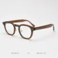 Detailed view of vintage thick acetate optical glasses frame in brown with clear lenses. - Brown Tea C4