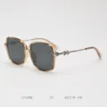 Detailed view of the stylish large-frame polarized sunglasses with gradient brown translucent rims. - Champagne C5