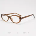 Detail view of vintage small oval eyeglasses frame in brown color, clear side structure. - Brown Tea C3