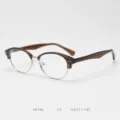 Vintage half-frame glasses frame detail showing brown acetate brow and metal rim, K9184 C3. - Brown Tea C3