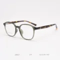 Detail view of the stylish 26021 TR90 optical glasses frame with tortoise temples. - Green Frame with Tortoise Temples C4