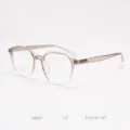 Transparent brown TR90 eyeglasses frame detail view, stylish lightweight optical glasses side close-up. - Gradient Pink C7