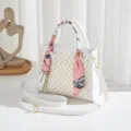White leather handbag with monogram pattern and chic scarf handle for women daily casual wear. - White